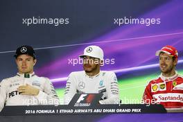 The post race FIA Press Conference (L to R): Nico Rosberg (GER) Mercedes AMG F1, second; Lewis Hamilton (GBR) Mercedes AMG F1, race winner; Sebastian Vettel (GER) Ferrari, third. 27.11.2016. Formula 1 World Championship, Rd 21, Abu Dhabi Grand Prix, Yas Marina Circuit, Abu Dhabi, Race Day.