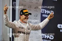 Nico Rosberg (GER) Mercedes AMG F1 celebrates his second position and World Championship on the podium. 27.11.2016. Formula 1 World Championship, Rd 21, Abu Dhabi Grand Prix, Yas Marina Circuit, Abu Dhabi, Race Day.
