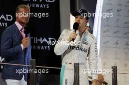 World Champion Nico Rosberg (GER) Mercedes AMG F1 on the podium. 27.11.2016. Formula 1 World Championship, Rd 21, Abu Dhabi Grand Prix, Yas Marina Circuit, Abu Dhabi, Race Day.