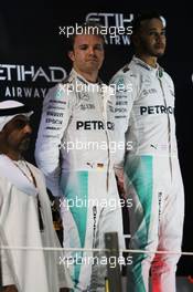The podium (L to R): second placed World Champion Nico Rosberg (GER) Mercedes AMG F1 with race winner and team mate Lewis Hamilton (GBR) Mercedes AMG F1. 27.11.2016. Formula 1 World Championship, Rd 21, Abu Dhabi Grand Prix, Yas Marina Circuit, Abu Dhabi, Race Day.
