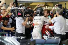 Nico Rosberg (GER) Mercedes AMG F1  and Sebastian Vettel (GER) Scuderia Ferrari  27.11.2016. Formula 1 World Championship, Rd 21, Abu Dhabi Grand Prix, Yas Marina Circuit, Abu Dhabi, Race Day.