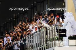 Race winner Lewis Hamilton (GBR) Mercedes AMG F1 celebrates on the podium. 27.11.2016. Formula 1 World Championship, Rd 21, Abu Dhabi Grand Prix, Yas Marina Circuit, Abu Dhabi, Race Day.