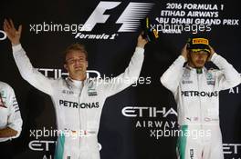 2nd place Nico Rosberg (GER) Mercedes AMG Petronas F1 W07 and 1st place Lewis Hamilton (GBR) Mercedes AMG F1 W07 . 27.11.2016. Formula 1 World Championship, Rd 21, Abu Dhabi Grand Prix, Yas Marina Circuit, Abu Dhabi, Race Day.