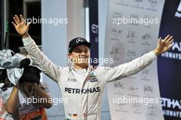 World Champion Nico Rosberg (GER) Mercedes AMG F1 celebrates on the podium. 27.11.2016. Formula 1 World Championship, Rd 21, Abu Dhabi Grand Prix, Yas Marina Circuit, Abu Dhabi, Race Day.