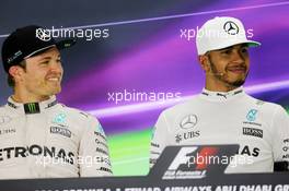 (L to R): Nico Rosberg (GER) Mercedes AMG F1 in the FIA Press Conference with team mate Lewis Hamilton (GBR) Mercedes AMG F1. 27.11.2016. Formula 1 World Championship, Rd 21, Abu Dhabi Grand Prix, Yas Marina Circuit, Abu Dhabi, Race Day.