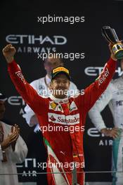3rd place Sebastian Vettel (GER) Scuderia Ferrari SF16-H. 27.11.2016. Formula 1 World Championship, Rd 21, Abu Dhabi Grand Prix, Yas Marina Circuit, Abu Dhabi, Race Day.