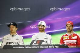 The post race FIA Press Conference (L to R): Nico Rosberg (GER) Mercedes AMG F1, second; Lewis Hamilton (GBR) Mercedes AMG F1, race winner; Sebastian Vettel (GER) Ferrari, third. 27.11.2016. Formula 1 World Championship, Rd 21, Abu Dhabi Grand Prix, Yas Marina Circuit, Abu Dhabi, Race Day.