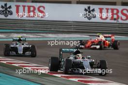 Lewis Hamilton (GBR) Mercedes AMG F1 W07 Hybrid leads team mate Nico Rosberg (GER) Mercedes AMG F1 W07 Hybrid. 27.11.2016. Formula 1 World Championship, Rd 21, Abu Dhabi Grand Prix, Yas Marina Circuit, Abu Dhabi, Race Day.