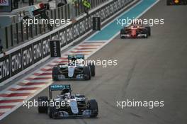 Lewis Hamilton (GBR) Mercedes AMG F1 W07 Hybrid leads team mate Nico Rosberg (GER) Mercedes AMG F1 W07 Hybrid. 27.11.2016. Formula 1 World Championship, Rd 21, Abu Dhabi Grand Prix, Yas Marina Circuit, Abu Dhabi, Race Day.