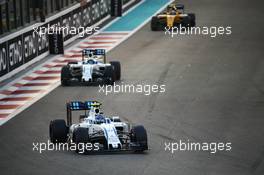 Valtteri Bottas (FIN) Williams FW38 leads team mate Felipe Massa (BRA) Williams FW38. 27.11.2016. Formula 1 World Championship, Rd 21, Abu Dhabi Grand Prix, Yas Marina Circuit, Abu Dhabi, Race Day.
