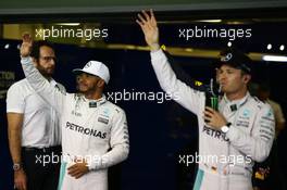 Lewis Hamilton (GBR) Mercedes AMG F1 W07  and Nico Rosberg (GER) Mercedes AMG Petronas F1 W07. 26.11.2016. Formula 1 World Championship, Rd 21, Abu Dhabi Grand Prix, Yas Marina Circuit, Abu Dhabi, Qualifying Day.
