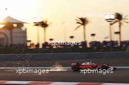 Kimi Raikkonen (FIN) Ferrari SF16-H sends sparks flying. 26.11.2016. Formula 1 World Championship, Rd 21, Abu Dhabi Grand Prix, Yas Marina Circuit, Abu Dhabi, Qualifying Day.