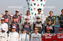 Pascal Wehrlein (GER) Manor Racing and Esteban Ocon (FRA) Manor Racing at the end of season group drivers group photograph. 27.11.2016. Formula 1 World Championship, Rd 21, Abu Dhabi Grand Prix, Yas Marina Circuit, Abu Dhabi, Race Day.