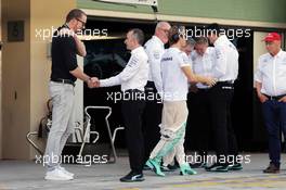 Paddy Lowe (GBR) Mercedes AMG F1 Executive Director (Technical) with Georg Nolte (GER) Driver Manager of Nico Rosberg (GER) Mercedes AMG F1. 27.11.2016. Formula 1 World Championship, Rd 21, Abu Dhabi Grand Prix, Yas Marina Circuit, Abu Dhabi, Race Day.