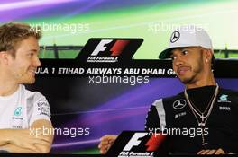 (L to R): Nico Rosberg (GER) Mercedes AMG F1 with team mate Lewis Hamilton (GBR) Mercedes AMG F1 in the FIA Press Conference. 24.11.2016. Formula 1 World Championship, Rd 21, Abu Dhabi Grand Prix, Yas Marina Circuit, Abu Dhabi, Preparation Day.