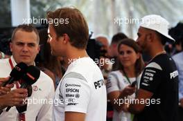 (L to R): Nico Rosberg (GER) Mercedes AMG F1 with team mate Lewis Hamilton (GBR) Mercedes AMG F1. 24.11.2016. Formula 1 World Championship, Rd 21, Abu Dhabi Grand Prix, Yas Marina Circuit, Abu Dhabi, Preparation Day.