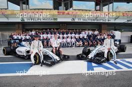 (L to R): Felipe Massa (BRA) Williams; Paul di Resta (GBR) Williams Reserve Driver; and Valtteri Bottas (FIN) Williams, at a team photograph. 24.11.2016. Formula 1 World Championship, Rd 21, Abu Dhabi Grand Prix, Yas Marina Circuit, Abu Dhabi, Preparation Day.