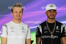 (L to R): Nico Rosberg (GER) Mercedes AMG F1 with team mate Lewis Hamilton (GBR) Mercedes AMG F1 in the FIA Press Conference. 24.11.2016. Formula 1 World Championship, Rd 21, Abu Dhabi Grand Prix, Yas Marina Circuit, Abu Dhabi, Preparation Day.