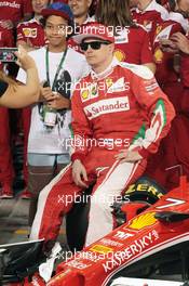 Kimi Raikkonen (FIN) Ferrari at a team photograph. 24.11.2016. Formula 1 World Championship, Rd 21, Abu Dhabi Grand Prix, Yas Marina Circuit, Abu Dhabi, Preparation Day.