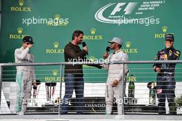 The podium (L to R): Nico Rosberg (GER) Mercedes AMG F1, second; Gerard Butler (GBR) Actor; Lewis Hamilton (GBR) Mercedes AMG F1, race winner; Daniel Ricciardo (AUS) Red Bull Racing, third. 23.10.2016. Formula 1 World Championship, Rd 18, United States Grand Prix, Austin, Texas, USA, Race Day.