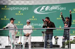 The podium (L to R): Nico Rosberg (GER) Mercedes AMG F1, second; Lewis Hamilton (GBR) Mercedes AMG F1, race winner; Gerard Butler (GBR) Actor; Daniel Ricciardo (AUS) Red Bull Racing, third. 23.10.2016. Formula 1 World Championship, Rd 18, United States Grand Prix, Austin, Texas, USA, Race Day.