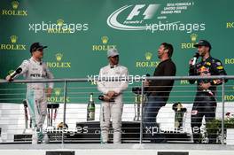 The podium (L to R): Nico Rosberg (GER) Mercedes AMG F1, second; Lewis Hamilton (GBR) Mercedes AMG F1, race winner; Gerard Butler (GBR) Actor; Daniel Ricciardo (AUS) Red Bull Racing, third. 23.10.2016. Formula 1 World Championship, Rd 18, United States Grand Prix, Austin, Texas, USA, Race Day.