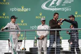 The podium (L to R): Nico Rosberg (GER) Mercedes AMG F1, second; Lewis Hamilton (GBR) Mercedes AMG F1, race winner; Gerard Butler (GBR) Actor; Daniel Ricciardo (AUS) Red Bull Racing, third. 23.10.2016. Formula 1 World Championship, Rd 18, United States Grand Prix, Austin, Texas, USA, Race Day.