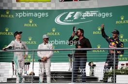 The podium (L to R): Nico Rosberg (GER) Mercedes AMG F1, second; Lewis Hamilton (GBR) Mercedes AMG F1, race winner; Gerard Butler (GBR) Actor; Daniel Ricciardo (AUS) Red Bull Racing, third. 23.10.2016. Formula 1 World Championship, Rd 18, United States Grand Prix, Austin, Texas, USA, Race Day.