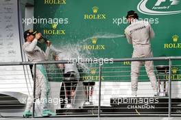 The podium (L to R): Nico Rosberg (GER) Mercedes AMG F1 celebrates with Victoria Vowles (GBR) Mercedes AMG F1 Partner Services Director and race winner Lewis Hamilton (GBR) Mercedes AMG F1. 23.10.2016. Formula 1 World Championship, Rd 18, United States Grand Prix, Austin, Texas, USA, Race Day.