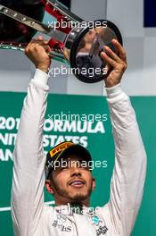 Race winner Lewis Hamilton (GBR) Mercedes AMG F1 celebrates on the podium. 23.10.2016. Formula 1 World Championship, Rd 18, United States Grand Prix, Austin, Texas, USA, Race Day.