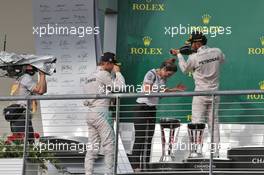 The podium (L to R): Nico Rosberg (GER) Mercedes AMG F1 celebrates with Victoria Vowles (GBR) Mercedes AMG F1 Partner Services Director and race winner Lewis Hamilton (GBR) Mercedes AMG F1. 23.10.2016. Formula 1 World Championship, Rd 18, United States Grand Prix, Austin, Texas, USA, Race Day.