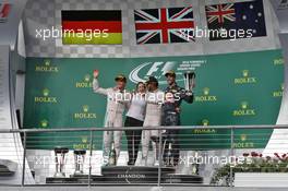 The podium (L to R): Nico Rosberg (GER) Mercedes AMG F1, second; Victoria Vowles (GBR) Mercedes AMG F1 Partner Services Director; Lewis Hamilton (GBR) Mercedes AMG F1, race winner; Daniel Ricciardo (AUS) Red Bull Racing, third. 23.10.2016. Formula 1 World Championship, Rd 18, United States Grand Prix, Austin, Texas, USA, Race Day.