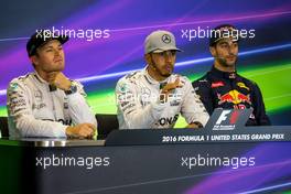 (L to R): Nico Rosberg (GER) Mercedes AMG F1 with Lewis Hamilton (GBR) Mercedes AMG F1 and Daniel Ricciardo (AUS) Red Bull Racing in the FIA Press Conference. 22.10.2016. Formula 1 World Championship, Rd 18, United States Grand Prix, Austin, Texas, USA, Qualifying Day.