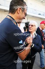 Bernie Ecclestone (GBR) with Carlos Slim Domit (MEX) Chairman of America Movil. 22.10.2016. Formula 1 World Championship, Rd 18, United States Grand Prix, Austin, Texas, USA, Qualifying Day.