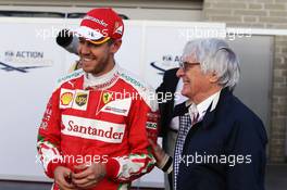 (L to R): Sebastian Vettel (GER) Ferrari with Bernie Ecclestone (GBR). 22.10.2016. Formula 1 World Championship, Rd 18, United States Grand Prix, Austin, Texas, USA, Qualifying Day.