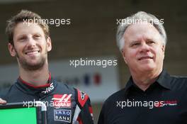 (L to R): Romain Grosjean (FRA) Haas F1 Team with Gene Haas (USA) Haas Automotion President at a team photograph. 23.10.2016. Formula 1 World Championship, Rd 18, United States Grand Prix, Austin, Texas, USA, Race Day.