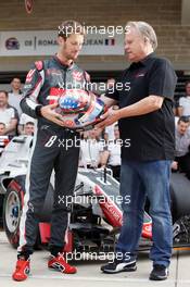 (L to R): Romain Grosjean (FRA) Haas F1 Team with Gene Haas (USA) Haas Automotion President at a team photograph. 23.10.2016. Formula 1 World Championship, Rd 18, United States Grand Prix, Austin, Texas, USA, Race Day.