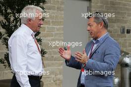 (L to R): Charlie Whiting (GBR) FIA Delegate with Francois Dumontier, Montreal Circuit Promoter. 23.10.2016. Formula 1 World Championship, Rd 18, United States Grand Prix, Austin, Texas, USA, Race Day.