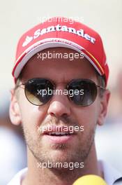 Sebastian Vettel (GER) Ferrari with the media. 20.10.2016. Formula 1 World Championship, Rd 18, United States Grand Prix, Austin, Texas, USA, Preparation Day.