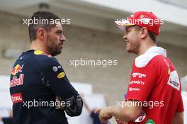 (L to R): Guillaume Rocquelin (ITA) Red Bull Racing Head of Race Engineering with Sebastian Vettel (GER) Ferrari. 20.10.2016. Formula 1 World Championship, Rd 18, United States Grand Prix, Austin, Texas, USA, Preparation Day.