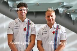 (L to R): Lance Stroll (CDN) Williams with Valtteri Bottas (FIN) Williams. 03.11.2016. Williams Driver Line-Up Announcement. Williams F1 Headquarters, Grove, England.