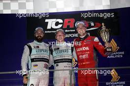 Race 1, Podium Race 1 with  1st position Jean-Karl Vernay Volkswagen Golf GTI TCR Leopard Racing  2nd position Stefano Comini (SUI) Volkswagen Golf GTI TCR, Leopard Racing  3rd position Pepe Oriola (ESP) SEAT Leon, Team Craft-Bamboo LUKOIL 17.09.2016. TCR International Series, Rd 9, Marina Bay Street Circuit, Singapore, Saturday.