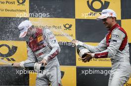 Podium: Race winner Rene Rast (GER) Audi Sport Team Rosberg, Audi RS 5 DTM and third placed Nico Muller (SUI) Audi Sport Team Abt Sportsline, Audi RS 5 DTM celebrates with the champagne. 24.09.2017, DTM Round 8, Red Bull Ring Spielberg, Austria, Sunday.