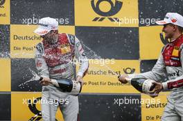 Podium: Race winner Rene Rast (GER) Audi Sport Team Rosberg, Audi RS 5 DTM and third placed Nico Muller (SUI) Audi Sport Team Abt Sportsline, Audi RS 5 DTM celebrates with the champagne. 24.09.2017, DTM Round 8, Red Bull Ring Spielberg, Austria, Sunday.
