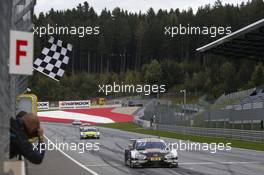 Race winner Rene Rast (GER) Audi Sport Team Rosberg, Audi RS 5 DTM takes the chequered flag at the end of the race. 24.09.2017, DTM Round 8, Red Bull Ring Spielberg, Austria, Sunday.