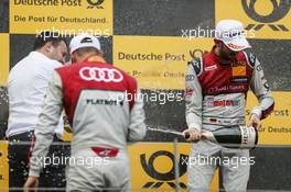 Podium: Race winner Rene Rast (GER) Audi Sport Team Rosberg, Audi RS 5 DTM and third placed Nico Muller (SUI) Audi Sport Team Abt Sportsline, Audi RS 5 DTM celebrates with the champagne. 24.09.2017, DTM Round 8, Red Bull Ring Spielberg, Austria, Sunday.