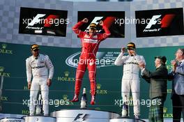 The podium (L to R): Lewis Hamilton (GBR) Mercedes AMG F1, second; Sebastian Vettel (GER) Ferrari, race winner; Valtteri Bottas (FIN) Mercedes AMG F1, third. 26.03.2017. Formula 1 World Championship, Rd 1, Australian Grand Prix, Albert Park, Melbourne, Australia, Race Day.