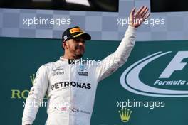 Lewis Hamilton (GBR) Mercedes AMG F1 celebrates his second position on the podium. 26.03.2017. Formula 1 World Championship, Rd 1, Australian Grand Prix, Albert Park, Melbourne, Australia, Race Day.