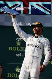 Lewis Hamilton (GBR) Mercedes AMG F1 celebrates his second position on the podium. 26.03.2017. Formula 1 World Championship, Rd 1, Australian Grand Prix, Albert Park, Melbourne, Australia, Race Day.