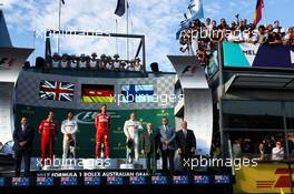 The podium (L to R): Lewis Hamilton (GBR) Mercedes AMG F1, second; Sebastian Vettel (GER) Ferrari, race winner; Valtteri Bottas (FIN) Mercedes AMG F1, third. 26.03.2017. Formula 1 World Championship, Rd 1, Australian Grand Prix, Albert Park, Melbourne, Australia, Race Day.